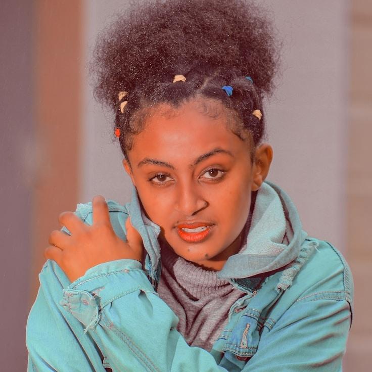 Portrait of Aria Chen, group coordinator and fusion cooking expert